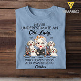 Personalized Never Underestimate An Old Lady Who Loves Dogs And Was Born In October T-shirt Printed QTHN247