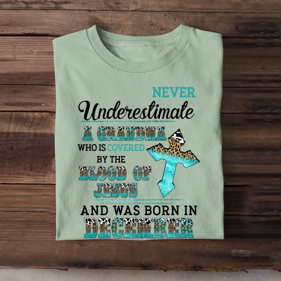 Personalized Never Underestimate A Grandma Who Is Covered By The Blood Of Jesus And Was Born In December Tshirt LDMVQ23409
